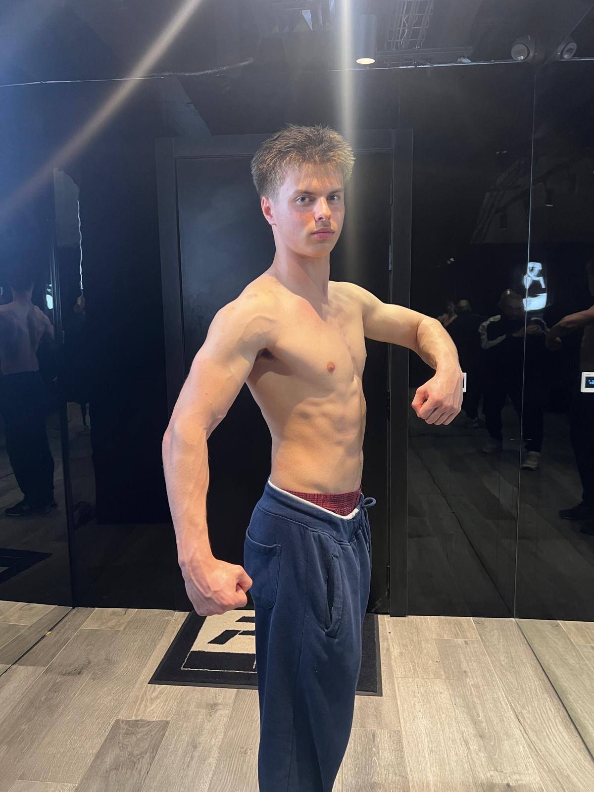 Alex flexing